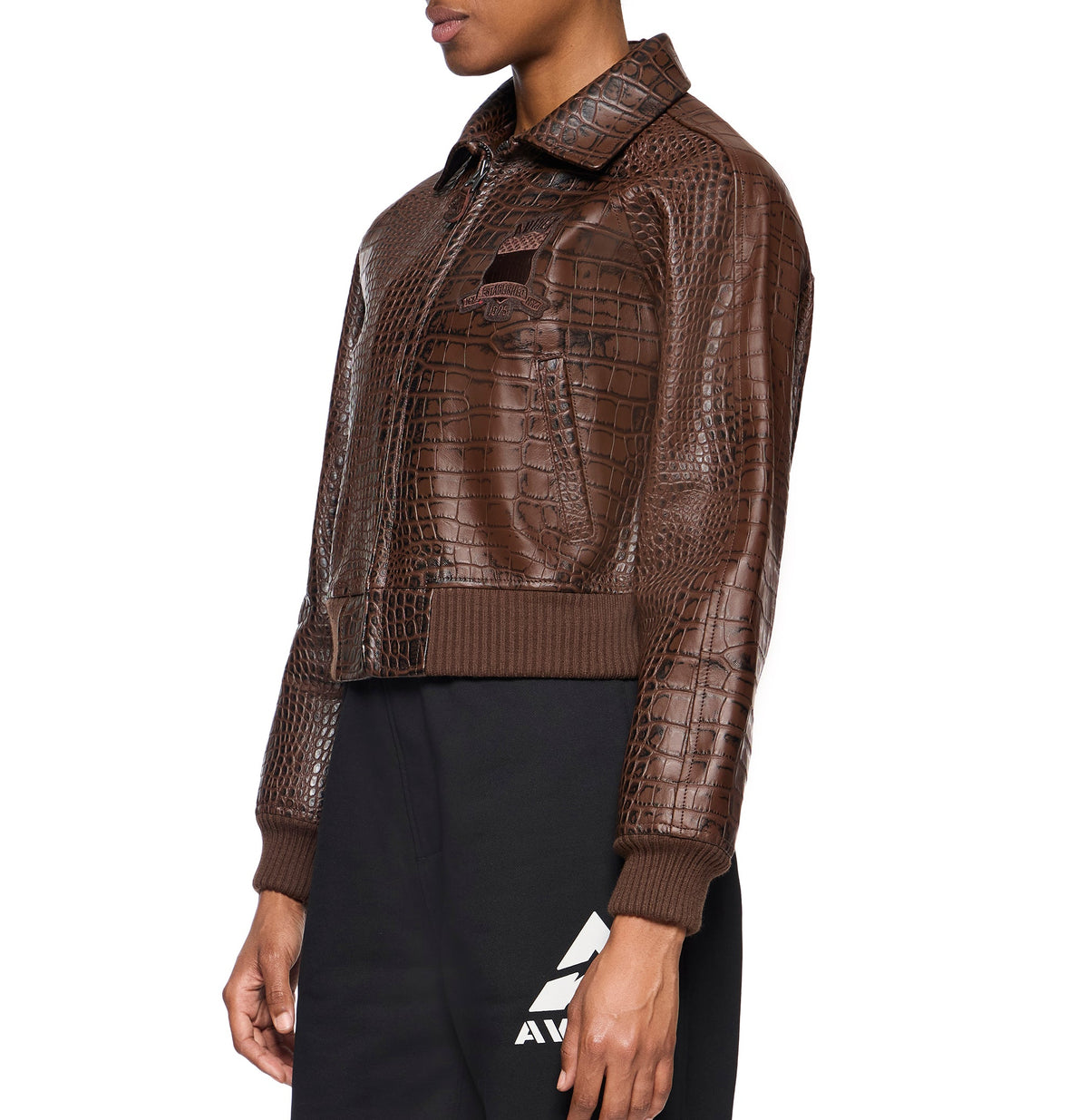 Cropped knitted waistband and tonal leather panel construction