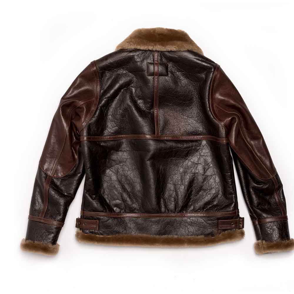 Brown leather jacket with fur trim on a white background