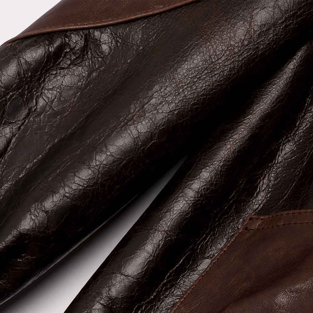 Close-up of brown leather gloves with a focus on texture and color.