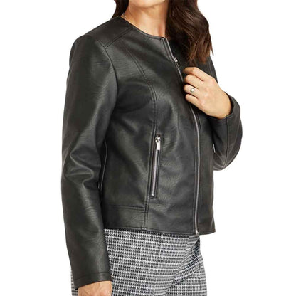 Black leather jacket worn by a person on a white background