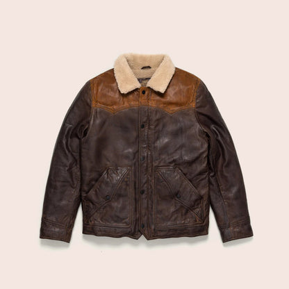 Brown leather jacket with beige shearling collar on a beige background
