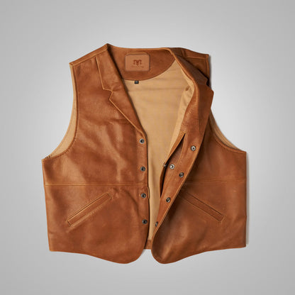 Brown leather waistcoat on a gray background