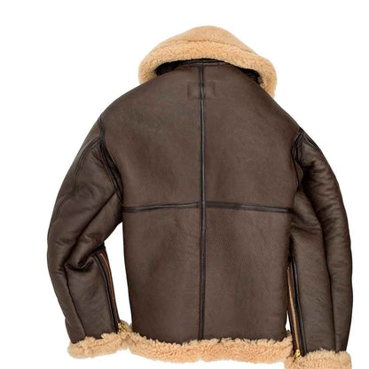 Brown leather jacket with beige fur lining on a white background