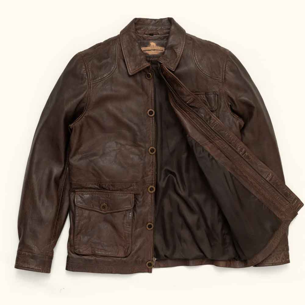 Brown leather jacket on a white background