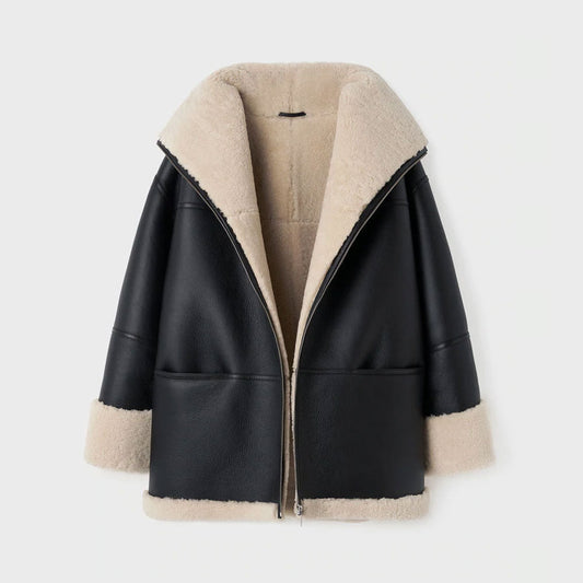 Black leather jacket with beige shearling collar and cuffs on a white background