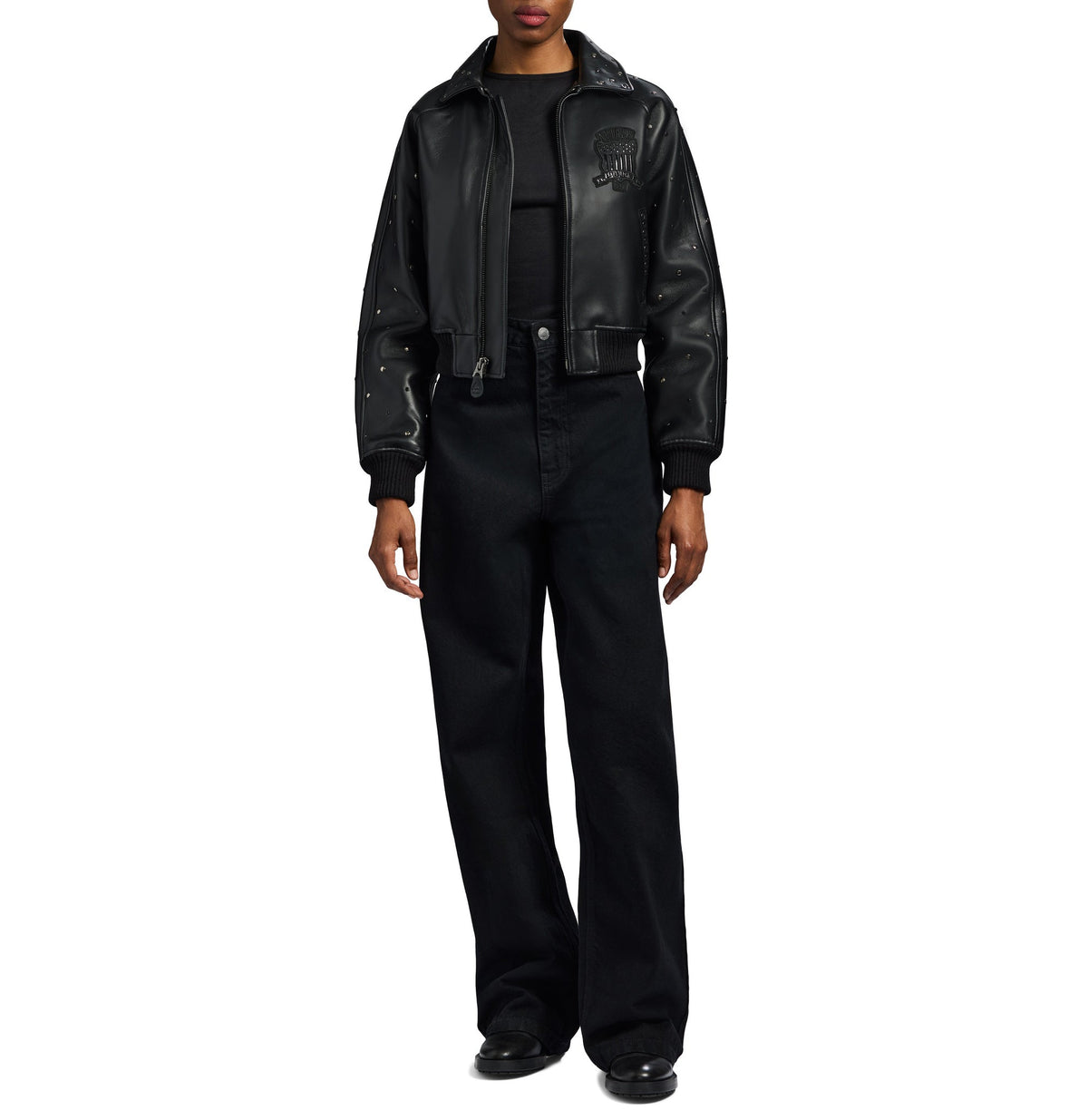 Metallic front zipper and ring pull on cropped leather jacket