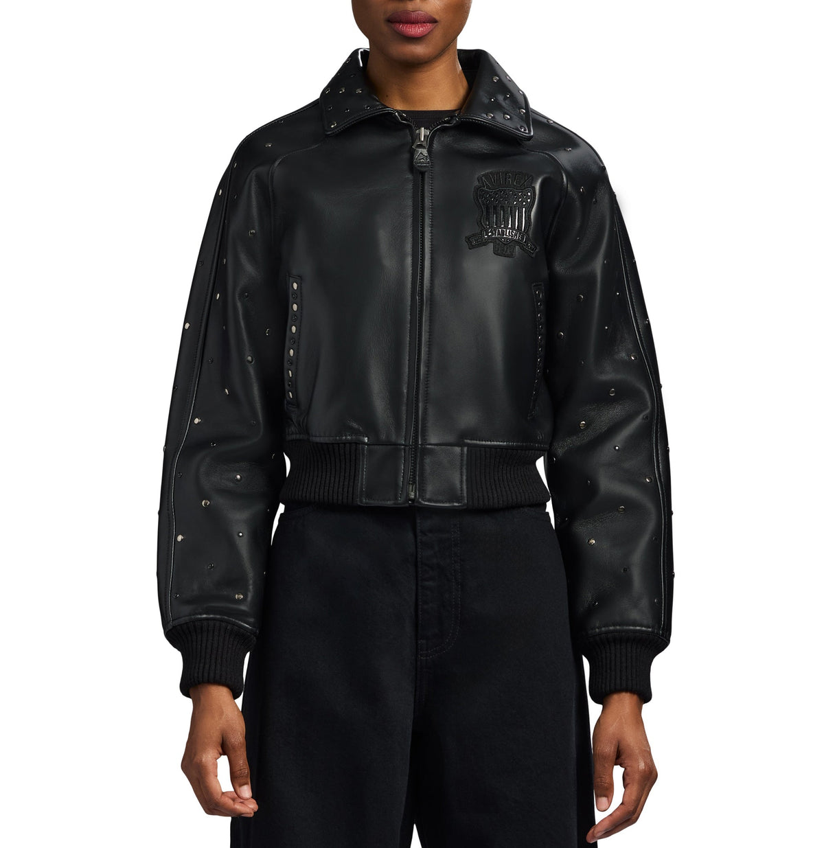Studded goatskin sleeve with black knitted rib cuff