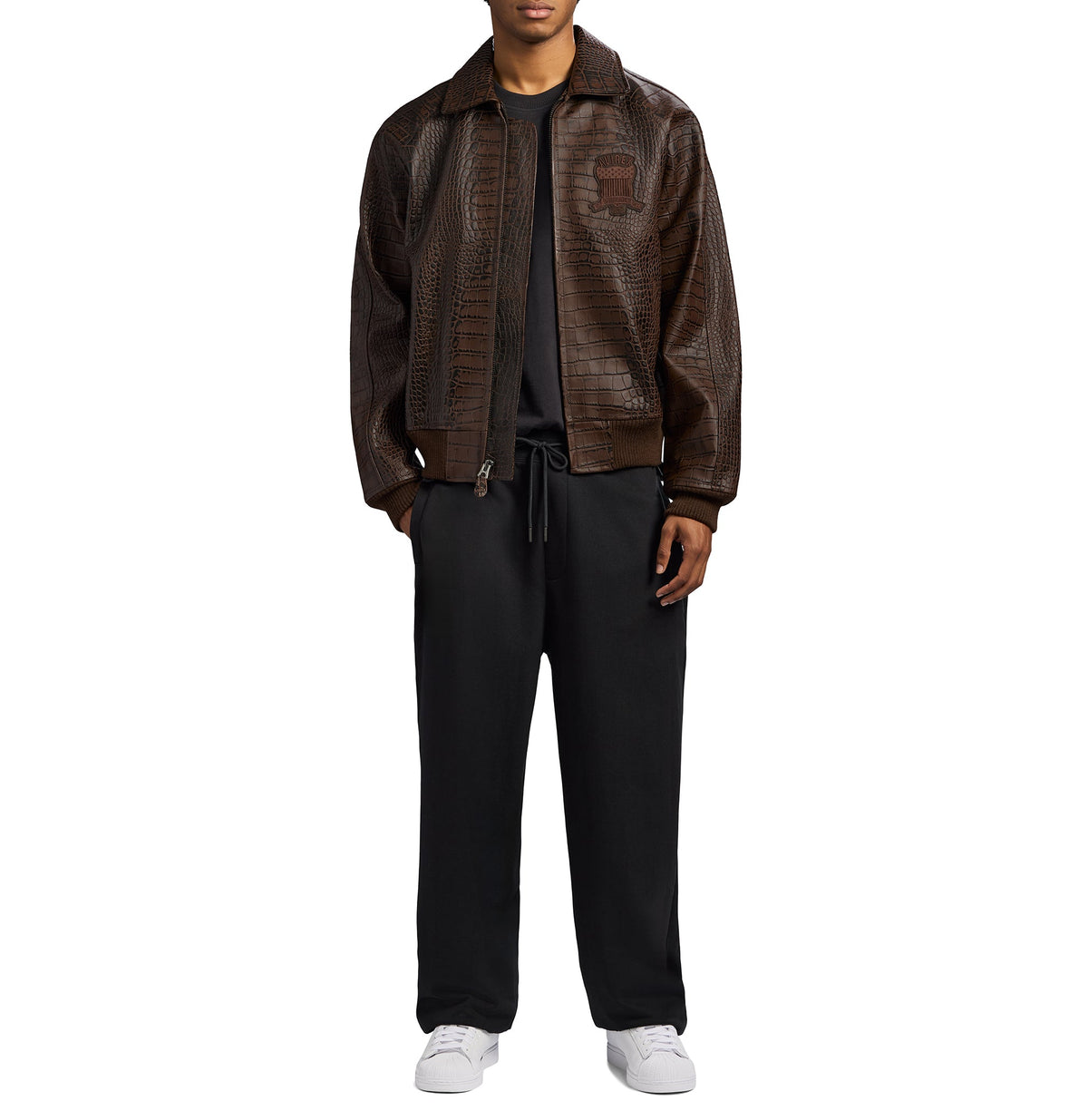 Male model wearing medium Avirex brown bomber jacket