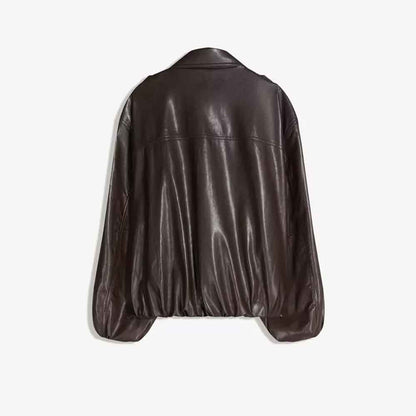 A dark brown leather jacket shown from the back, featuring a smooth texture and a relaxed fit, displayed against a light gray background.