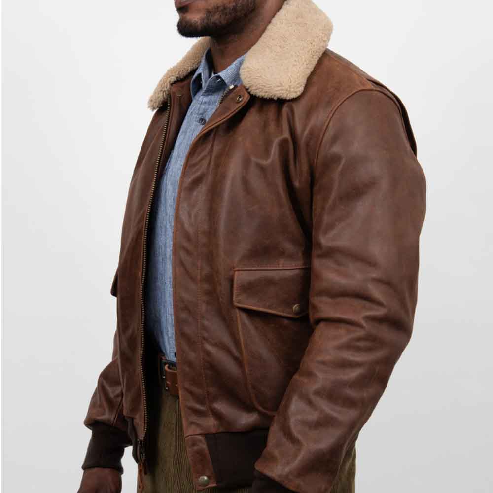 Brown leather jacket with beige fur collar on a white background