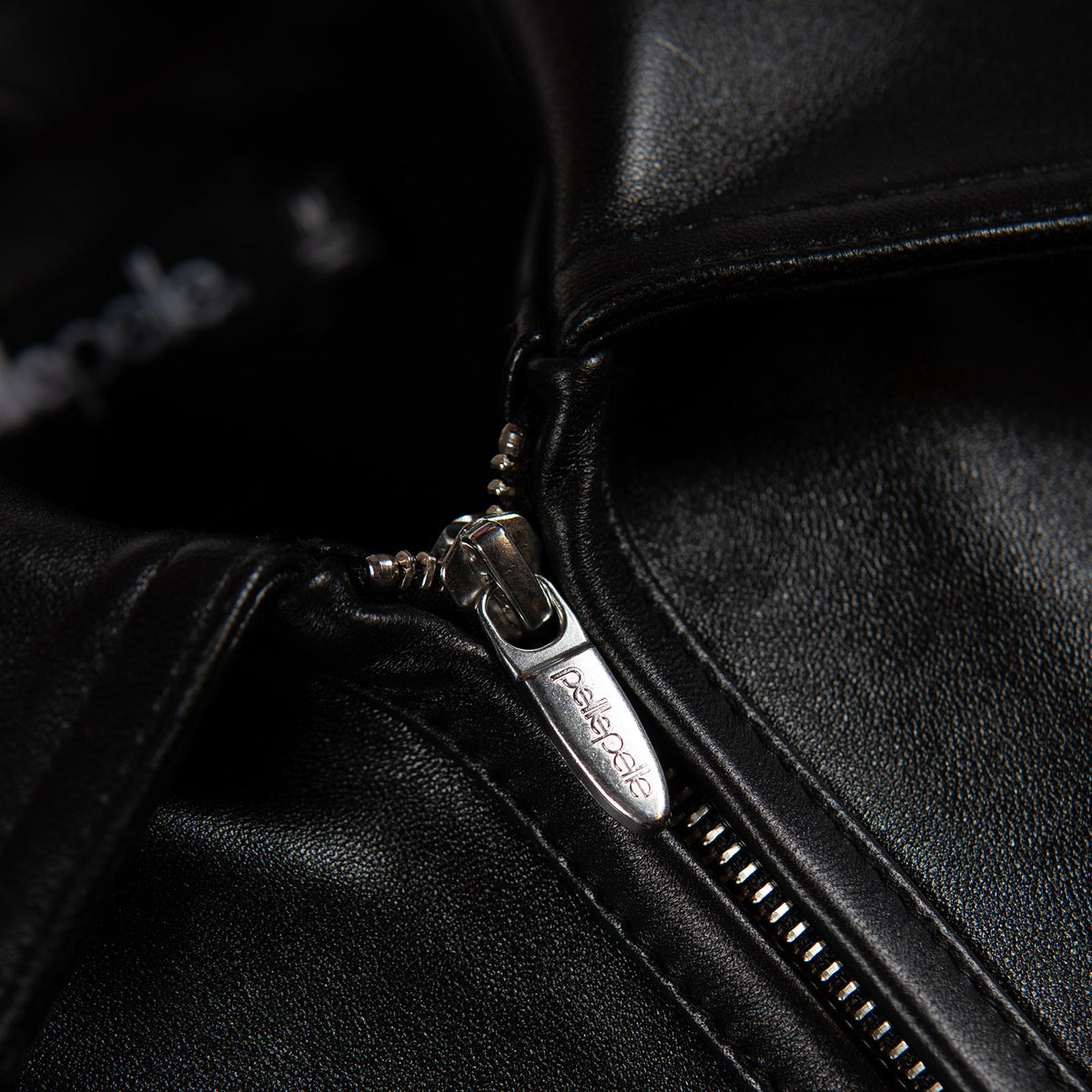 pelle pelle branding on zipper hook