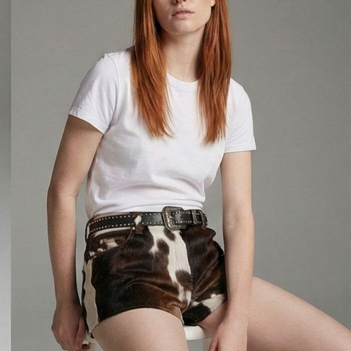 women wearing Shirt and cowhide leather shorts