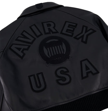 Angled welt pockets on women’s cropped black leather jacket