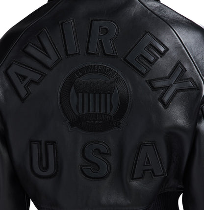 Tonal embroidered crest on black Avirex jacket back