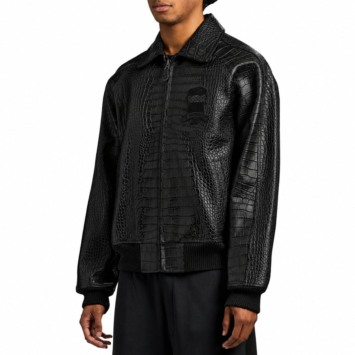 Male model wearing medium Avirex black leather bomber jacket