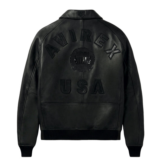 Man wearing black Avirex Iconic jacket showing oversized back branding