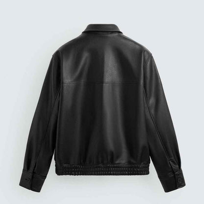 Black leather jacket on a light gray background