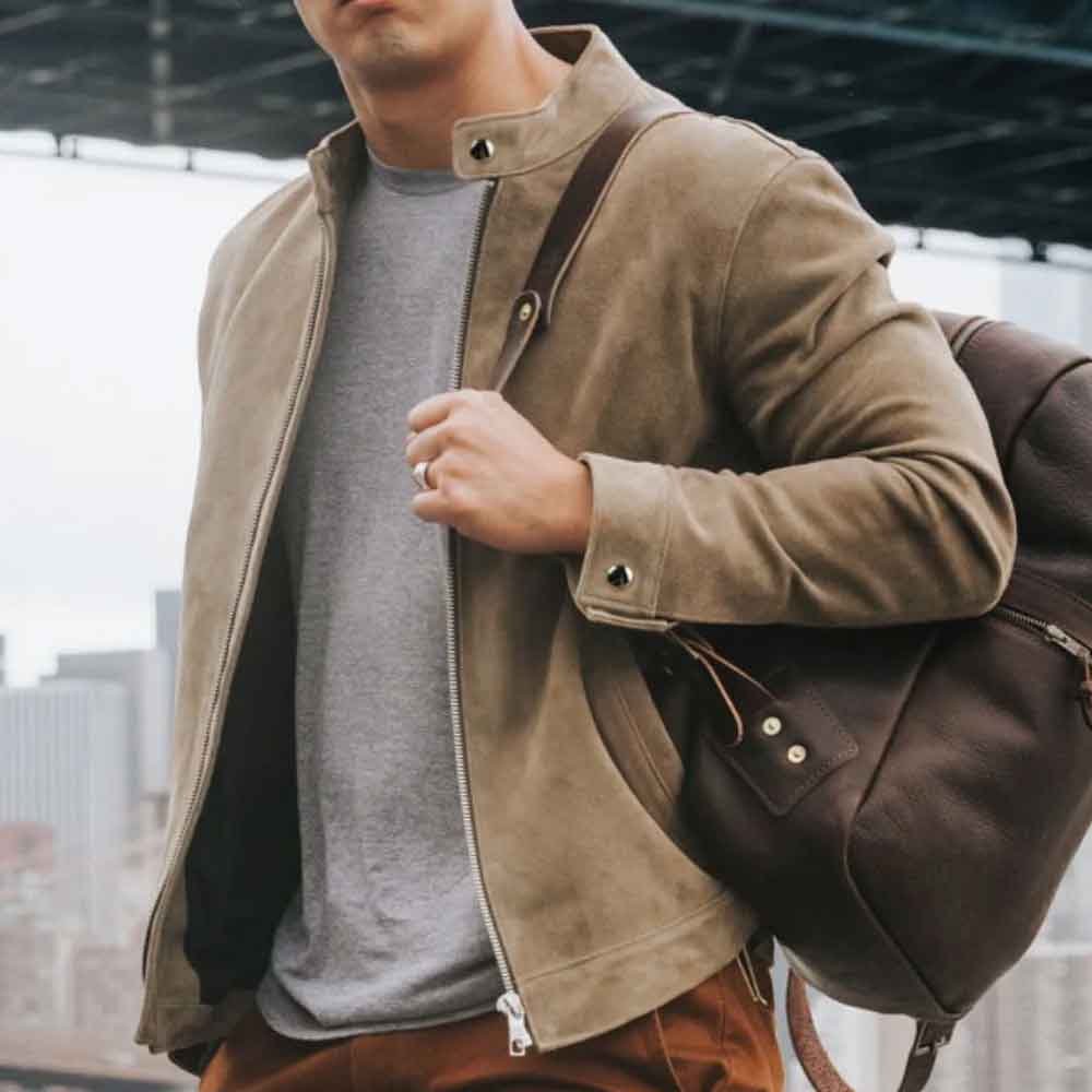 Close up of a man wearing suede leather cafe racer jacket