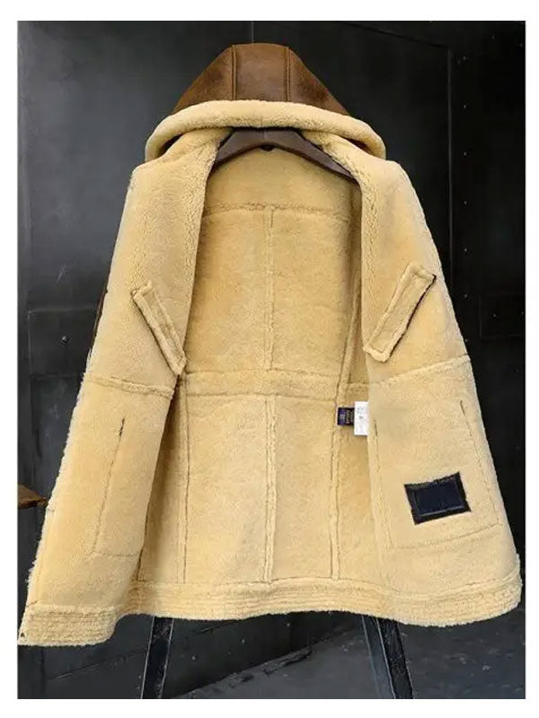 Beige sherpa jacket with brown hood on a black background