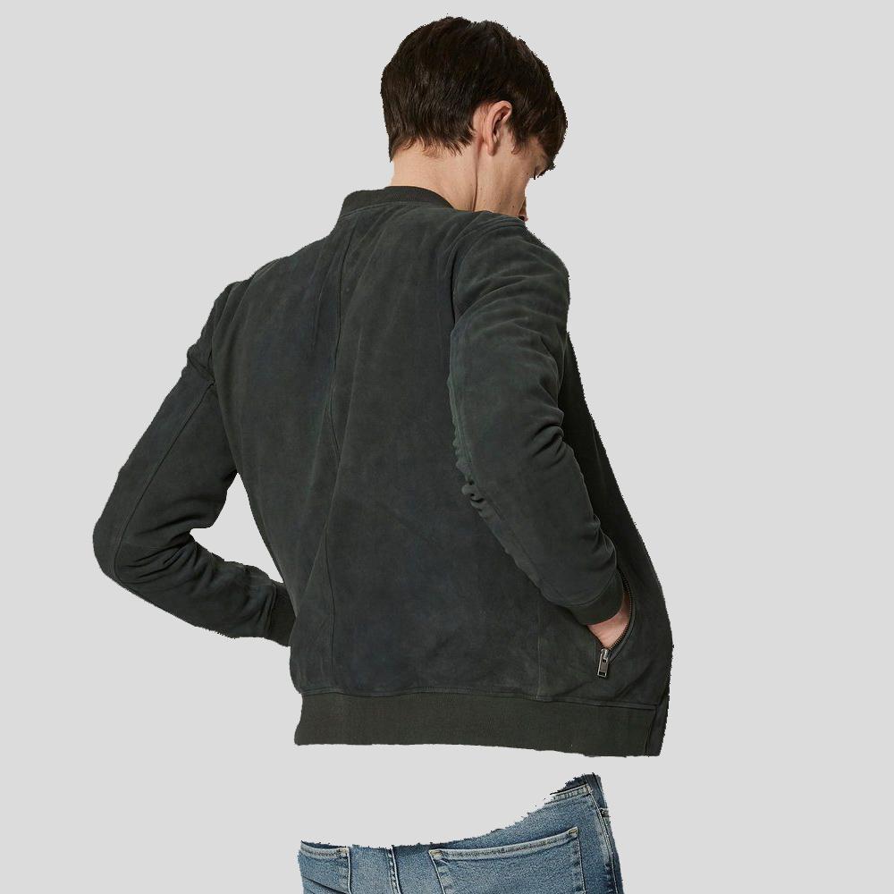 Person wearing a dark blue jacket on a light gray background