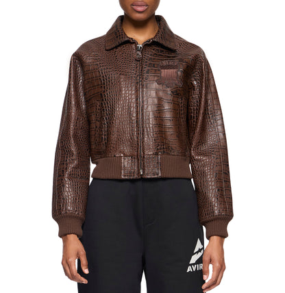 Angled welt pocket and textured brown leather front panel