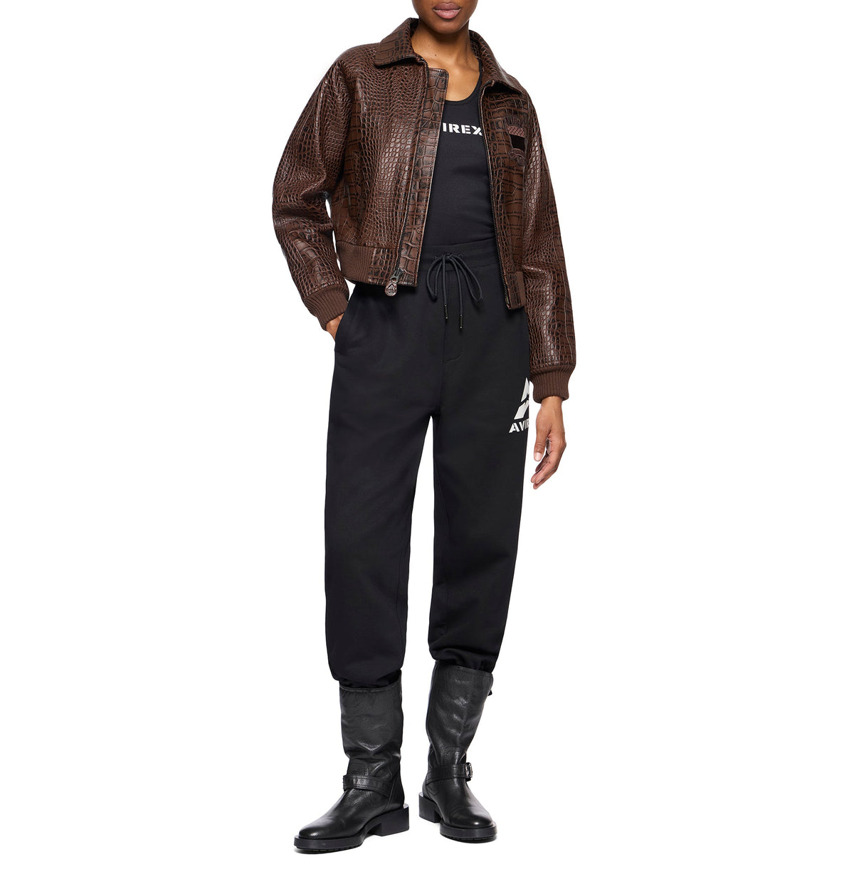 Woman wearing a brown cropped Avirex croc-effect leather jacket